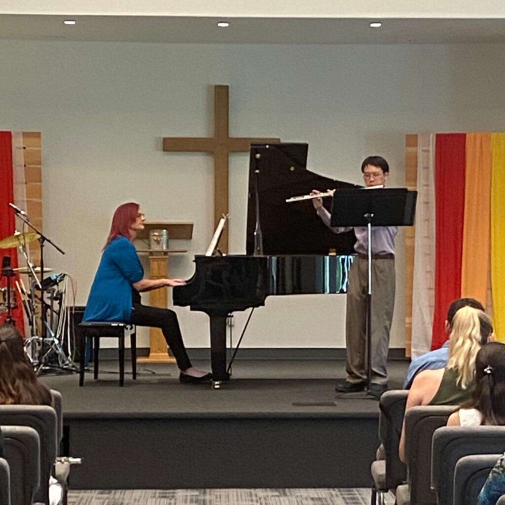 Performance of Dawn and her student at a recital